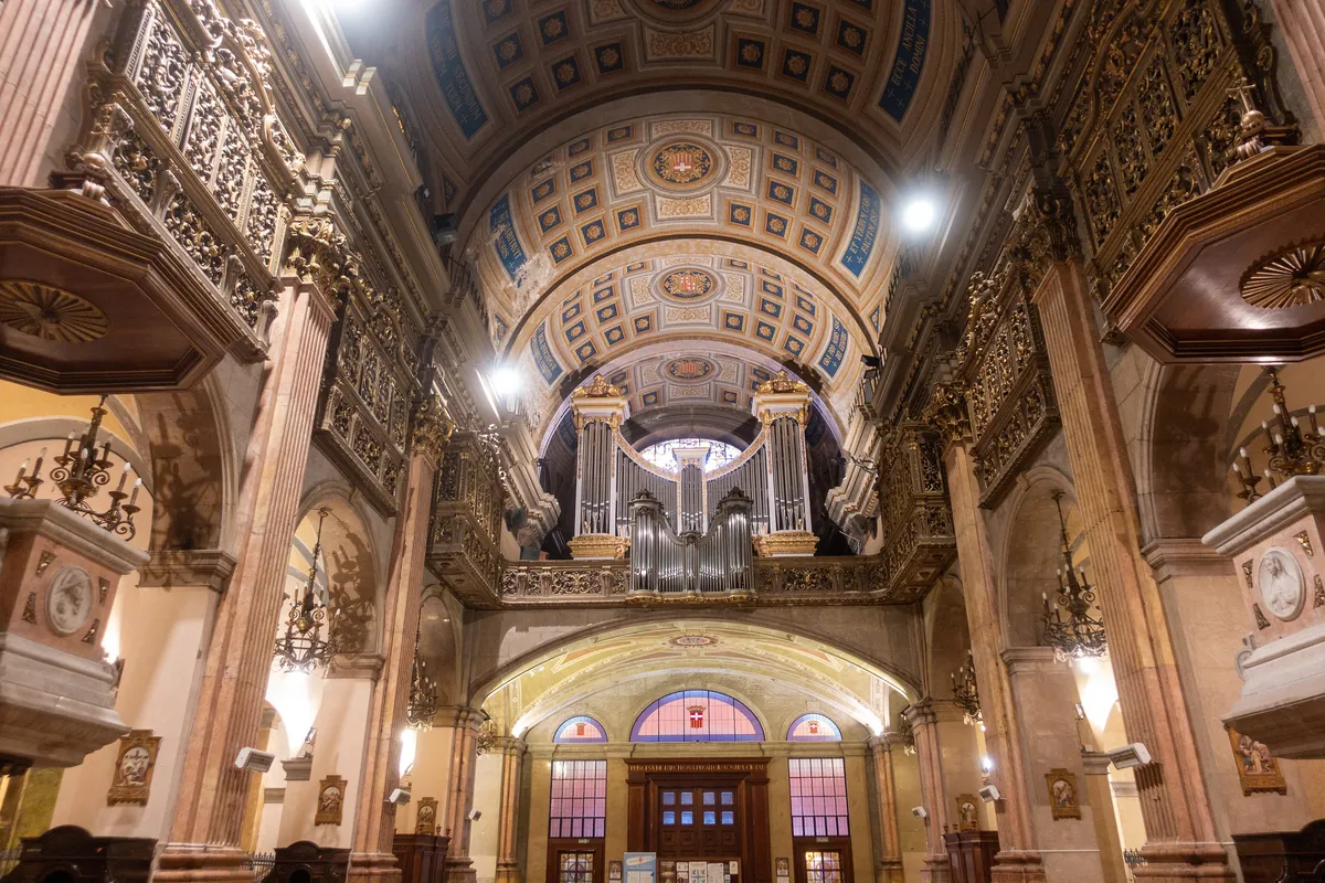The vault and organ loft above the entrance.